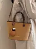 Bolso tote pequeño para mujer para el trabajo, nuevo bolso de hombro retro para ir al trabajo Otoño 2026, bolso cruzado tipo cubo versátil