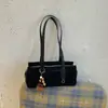 Bolsa de Ombro Estilo Baguete Retrô Outono/Inverno de Nicho para Mulheres Nova Grande Capacidade Estilosa Versátil Camurça Pelúcia Ombro Único de Mão