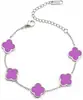 Pulsera de acero de titanio chapada en oro de 18k, de cuatro hojas, lisa, de moda, de venta caliente, con nácar de doble cara, fábrica de joyería de alta gama para mujer
