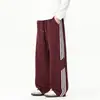Pantalones deportivos de rayas de moda para hombre, colección de otoño, versátiles y elegantes, talla grande, corte holgado, pierna recta, pantalones largos casuales para hombre