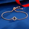 Nuevo brazalete de proyección de venta caliente transfronteriza imagen a color foto personalización nano 100 idiomas Te amo brazalete