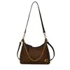 Bolso de axila de gamuza mate vintage para mujer, Nuevo bolso de hombro cruzado texturizado de nicho de alta gama Otoño/Invierno 2026