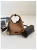 Bolso pequeño de mano de felpa y gamuza elegante transfronterizo para mujer, nuevo, textura retro, bolso tipo cubo, nicho, bandolera, bolso cruzado, moderno