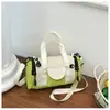 2026 Nuevo Bolso Redondo Cilíndrico de Bloques de Color de Moda Bolso de Mano Hombro Cruzado Bidireccional Multifuncional Casual Versátil para el Trabajo Bolso de Mujer Bolso de Mamá