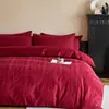 Juego de ropa de cama de cuatro piezas de jacquard de algodón lavado teñido en hilo de algodón de doble capa para celebración de bodas en color rojo, adecuado para regalos de boda