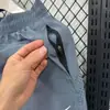 Shorts Esportivos Populares Fitness Respirável Secagem Rápida Masculino e Feminino Soltos para Corrida Shorts de Três Pontos Falso Duas Peças Anti-Exposição