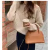 Otoño e Invierno Nuevo Tejido de Lana Pura para Mujer Suéter de Cuello Redondo Color Sólido Patrón Retorcido Holgado Moda Suave y Sedoso Tejido Base