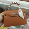 Bolsa Kelly Segunda Geração Padrão Palmeira 2026 Modelo Novo Bolsa Feminina de Alto Padrão Mini Bolsa de Mão Bolsa Transversal Texturizada para Mulheres