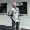 Camiseta de manga corta de malla para hombre, diseño de dos piezas falso de alta gama europeo y americano, diseño de nicho elegante de verano, marca de moda con hombreras, camiseta de manga media