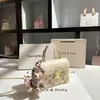 Dropshipping Bolsa Caixa Embossada de Nicho Estilo Francês 2026 Novo Modelo Primavera Bolsa Transversal Quadrada Pequena de Alto Padrão Atacado