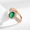 Anel Aberto de Luxo Transfronteiriço para Mulheres, apresentando uma Pedra Colorida de Formato Oval e repleto de Pedras Zircônias, exalando um estilo de moda europeu e americano de alta qualidade.