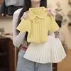 Estilo Coreano para Bebé Niña Verano Nuevo Moda Elegante Amarillo Ganso Tejido Polo Manga Corta Falda Plisada Conjunto de Dos Piezas Estilo de Moda