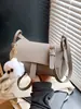 Bolsa Pequena Texturizada Retrô Transfronteiriça para Mulheres 2026 Novo Estilo Simples e Elegante Bolsa Almofada Bolsa de Ombro Transversal Retrô de Nicho