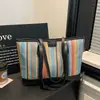 Bolso de Playa con Bloques de Color Rayas de Moda Tejido de Paja Colgante 2026 Estilo Coreano Elegante Nuevo Patchwork Veraniego