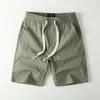 Nuevos shorts casuales simples de verano para hombre, pantalones ligeros de moda, pantalones casuales versátiles de cinco puntos con cordón estilo cargo.