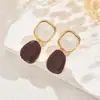 Nuevos Pendientes de Moda Geométricos para Mujer, Estilo de Nicho de Gama Alta con Tachuelas de Piedra Roja, Pendientes Versátiles para Mujer