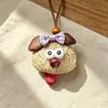 Encantador perrito peludo con la lengua fuera, llavero para bolso, colgante de dibujos animados natural, semillas de terapia de sonido curativas, popular en zonas escénicas, amuleto divertido y adorable