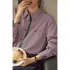 Camisa vertical a rayas de color block retro francés solighter para mujer, nuevo estilo primavera 2026, top cepillado de manga larga
