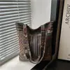 2025 Rayas Gran Capacidad Otoño e Invierno Nueva Moda Color de Contraste Tendencia Casual Viaje Diario Casual Bolso Tote para Axila Hombro