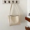 Bolsa transversal mãe e filho grande capacidade bolsa de axila feminina 2026 Outono estilo quente bolsa de ombro única bolsa tote retrô para o trabalho