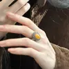 Chiba Taiyin Estilo Chino Nuevo Étnico Ámbar Superficie de Huevo Patrón de Pergamino Anillo Diseño Nicho Anillo Retro Estilo Nacional