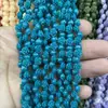 Polvo de concha repujado 8 mm camelia cuentas sueltas agujero recto para ensartar cuentas borla pulsera DIY collar accesorios de ropa al por mayor