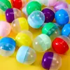 Cápsula de gashapon de fundo plano 62x67mm transfronteiriça, bola de gashapon de PP, bola de brinquedo de gashapon recarregável, caixa surpresa de gashapon, ovo giratório