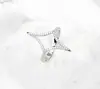 El juego de anillo y pulsera de moda de lujo más vendido de Amazon con diseño de ráfaga de estrellas calado y diamantes