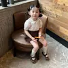 Conjunto de Verano Estilo Coreano para Niñas 26 Nuevo Estilo Academia Niña Pequeña Camisa de Manga Corta Plisada Cuello de Muñeca Pantalones Cortos de Encaje