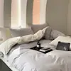 Juego de ropa de cama de algodón 100% de grado A para maternidad e infantil, juego de cuatro piezas de algodón puro con un diseño de dos tonos simple y de alta gama, que incluye funda de edredón, sábana plana y sábana bajera