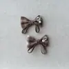Dulces accesorios de moño a cuadros, fundas para teléfono, zapatos para niños, muñecos para mascotas, materiales decorativos, accesorios para manualidades, calcetines, sombreros