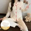 Pijama para mujer de comercio exterior al por mayor para primavera y otoño, con copas en el pecho, lindos lunares, diseño de nube de dibujos animados, conjunto de algodón de manga larga para casa