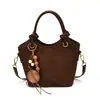 Bolso cubo de nuevo estilo, versión coreana, bolso cruzado de moda para primavera, bolso de hombro texturizado vintage para mujer 2026