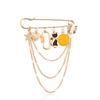 Joyería transfronteriza europea y americana multi-elemento cara sonriente amarilla borla colgante broche accesorios estilo punk femenino colgante de temperamento