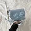 Bolsas de Alta Gama para Mujer 2026 Nuevo Estilo Bolso de Mano de Perlas para Viajar Bolso de Hombro Único Cruzado de Moda Diseño Simple de Nicho