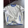 Camiseta deportiva casual de verano de manga corta, tejido ligero, secado rápido, ajuste limpio, cuello redondo, con bolsillo redondo con cremallera de dos tonos