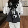 Mochila de lunares estilo coreano retro para mujer, nuevo modelo 2026, mochila a rayas de gran capacidad, bolsa de mano de nicho para el trabajo y libros