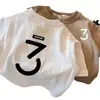 Nueva Camiseta Infantil 2026 para Niños y Niñas, Manga Corta de Verano, Algodón Estampado, Ropa Exterior para Bebé, Camiseta Base de Moda