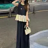 Saia de Conjunto Fashion para Mulheres 2025 Verão Novo Estilo Estilo Estrangeiro Folha de Lótus Costura Sem Mangas Conjunto de Duas Peças com Zíper