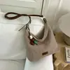Bolso tejido transfronterizo para mujer, nuevo bolso de hombro de paja de moda para vacaciones de verano 2026, bolsa de mano tipo tote de gran capacidad para el trabajo