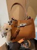 Bolsas Retro de Nicho de Alto Padrão Transfronteiriças para Mulheres Nova Coleção Primavera 2026 Versátil Casual Bolsa Transversal Bolsa de Mão Bolsa Saco