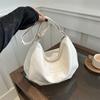 Bolsa de Ombro Grande Capacidade Couro Macio Estilo Coreano Fashionável Feminina Nova Primavera 2024 Versátil para o Trabalho Bolsa Tote Têxtil para Mulheres