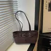 Bolso de Hombro Único Versátil Nuevo Estiloso para Viajes de Otoño/Invierno 2026 Bolso de Axila de Cuero de Alta Gama de Nicho para Mujer