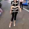 0010 Da Ai Mei Yi Yuan Verano 2026 Nueva Moda Top de Gasa con Cuello en V de Manga Corta y Leggings de Siete Puntos Ropa para Mujer