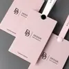 Fábrica de Etiquetas Colgantes y Etiquetas Personalizadas, Etiquetas Colgantes Personalizadas con Cierres de Seguridad Anti-Manipulación, Etiquetas Colgantes para Ropa, Etiquetas Antirrobo Personalizadas con Patrón Milán