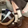 Meias de bolinhas femininas estilo japonês versáteis de cano médio outono novo estilo cor de café meias largas absorventes de suor respiráveis sem costura meias longas