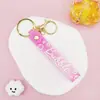 Llavero Colgante de Cordón de Cuero con Letra Transparente Brillante con Accesorios Estilo Muñeca Rellena de Aceite Encanto de Llavero Pulsera Venta al por Mayor