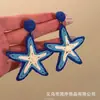 Pendientes Redondos de Flor con Borlas Estilo Resort Fresco de Playa, Lujo Ligero y Sensación de Alta Gama, Pendientes Versátiles con Sentido de Atmósfera