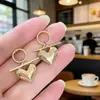 Pendientes Europeos y Americanos de Lujo Ligero de Nicho Exagerados con Forma de Corazón Tridimensional para Mujer, Pendientes Brillantes de Forma de Corazón Simples de Gama Alta