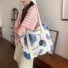 2024 nueva versión coreana de bolso casual de hombro Joker bolso de lona de gran capacidad bolso de moda para estudiantes una generación de cabello